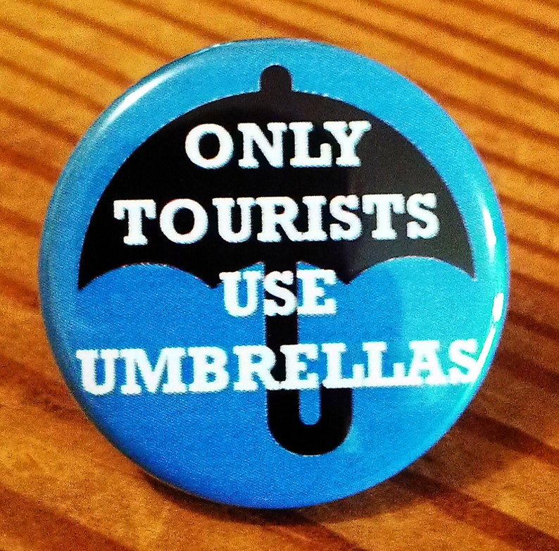 In Portland ONLY TOURISTS use UMBRELLAS Button, Magnet, or Bottle Opener image 1