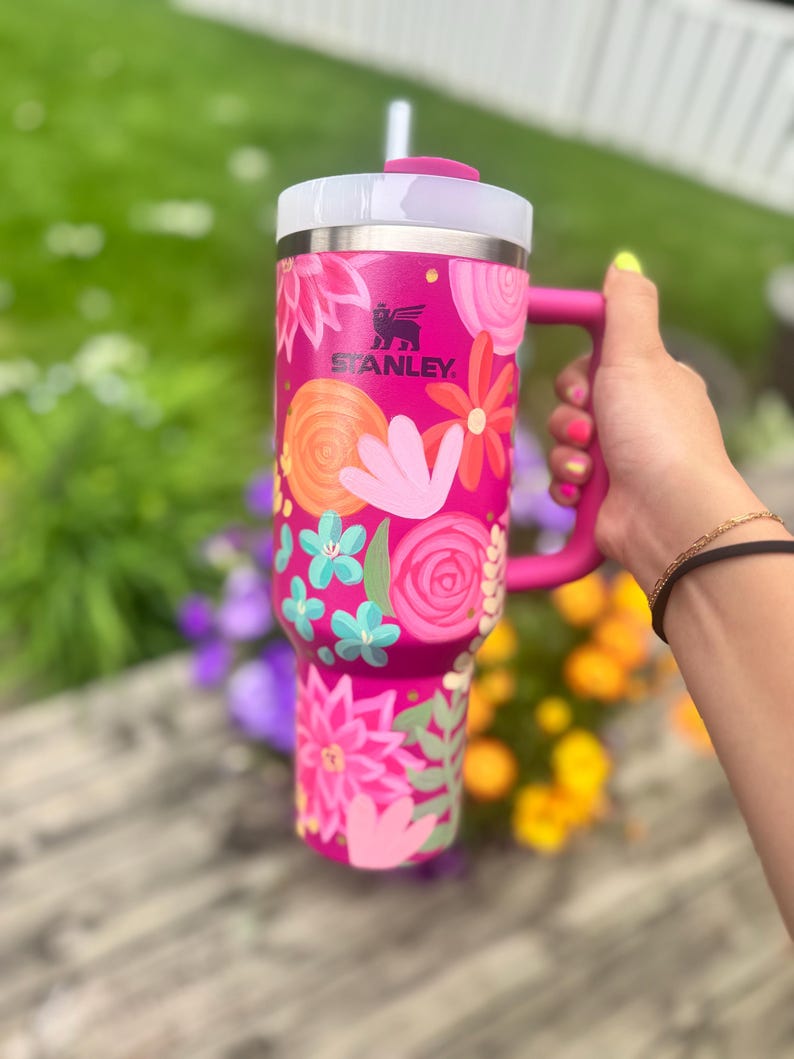 May include: A set of three ceramic mugs with a speckled, matte finish in cream, light grey, and dark grey. Each mug has a simple, minimalist design, suitable for coffee or tea.