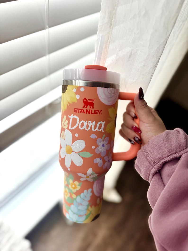 May include: A handcrafted wooden sign, painted white with a distressed effect, displaying the words "Welcome to our home" in a handwritten font. The sign has a dark brown border and is suitable for indoor or outdoor use.