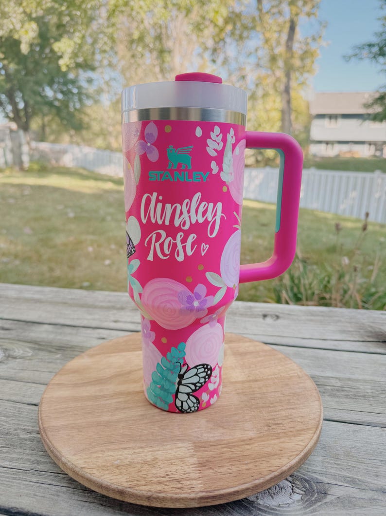 May include: A rustic wooden sign with the text "Welcome to our home" in white lettering. The sign has a distressed finish and a simple, inviting design, ideal for entryway decor.