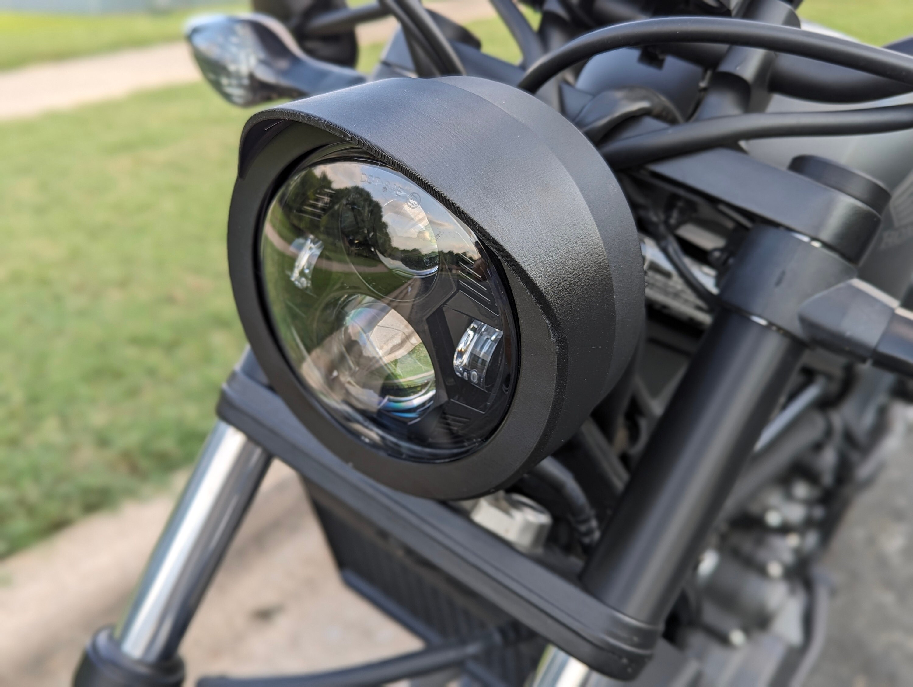 thumbnail image 2 of Genuine Honda Headlight Cowl – Matte Black For CMX300 / CMX500 Rebel (08R70-K87-A30) 2 of 6