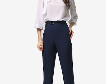 Straight-leg trousers with a high waist, fastened with a concealed zipper at the back, featuring belt loops.