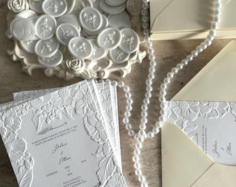 Invitation cards with floral embossing