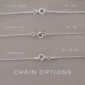 May include: Three silver chains with different styles and lengths. The top chain is 1.3 mm cable, the middle chain is 1.3 mm rolo, and the bottom chain is 1 mm bead. Each chain is available in 16, 18, and 20 inches. The text "CHAIN OPTIONS" is at the bottom of the image.