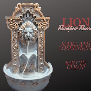 May include: A gold and white ceramic lion backflow incense burner. The lion's head is sculpted with intricate details and the incense flows down from its mouth into a basin below. The text "LION Backflow Burner" is written in red on a black background. The text "SMALL AND CONVENIENT!" and "EASY TO CLEAN!" is also written in red on a black background.