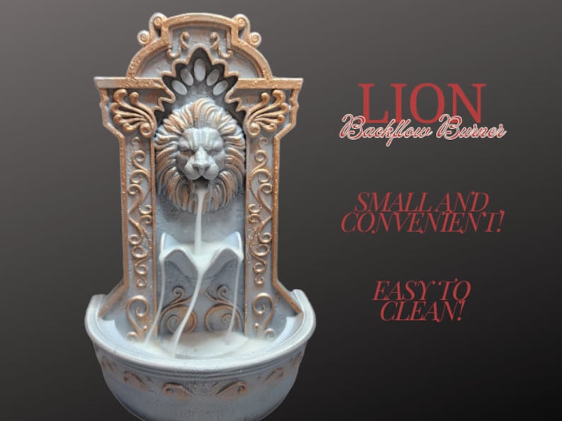 May include: A gold and white ceramic lion backflow incense burner. The lion's head is sculpted with intricate details and the incense flows down from its mouth into a basin below. The text "LION Backflow Burner" is written in red on a black background. The text "SMALL AND CONVENIENT!" and "EASY TO CLEAN!" is also written in red on a black background.