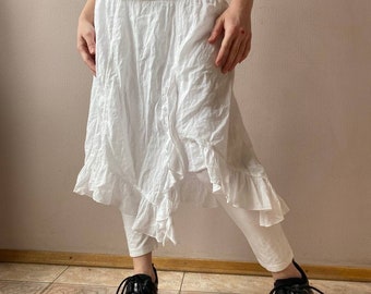 Avantgarde Asymetrical skirt with ties and leggings from Cream