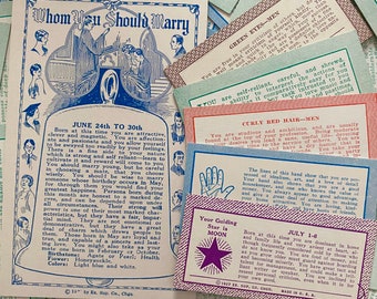 May include: Vintage divination cards with text, including "Whom You Should Marry" and astrological readings. The cards are in shades of blue, pink, and green, with illustrations and text. The cards are scattered on a light surface.