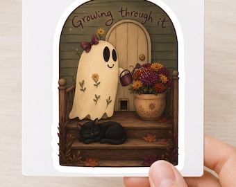 "Growing Through It" spooksticker voor herfsttuinliefhebbers