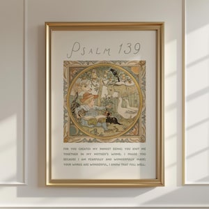 May include: A framed art print featuring Psalm 139. The artwork has a gold frame and a detailed illustration in a circular design with a variety of animals and a person. The text of the Psalm is below the illustration.