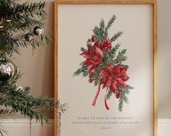 May include: A framed print featuring a watercolor illustration of red poinsettias, green pine needles, and red berries. The print includes the text "GLORY TO GOD IN THE HIGHEST and on earth peace to people of good will" and is displayed near a decorated Christmas tree.