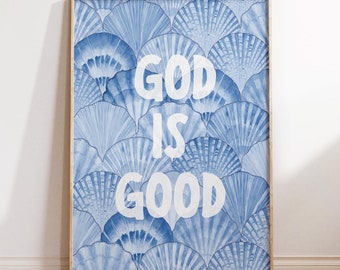 Puede incluir: Una impresión azul y blanca con un patrón de conchas marinas y el texto "God is good" en blanco.