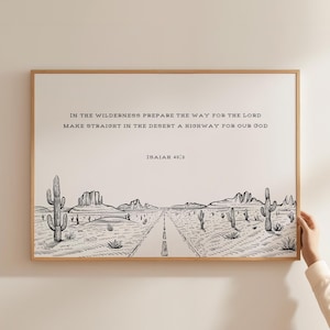 May include: Black and white illustration of a desert landscape with a road leading to the horizon. The text "IN THE WILDERNESS PREPARE THE WAY FOR THE LORD MAKE STRAIGHT IN THE DESERT A HIGHWAY FOR OUR GOD ISAIAH 40:3" is printed below the image.