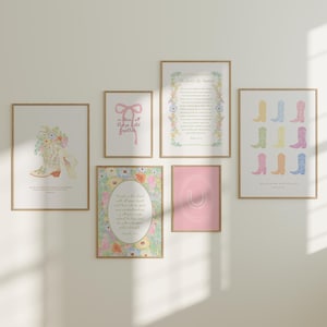 May include: A collection of framed art prints featuring watercolor illustrations and text. The prints include images of cowboy boots, floral arrangements, and inspirational quotes. The color palette is soft, with pastel pinks, yellows, and blues. The frames are a light wood color.
