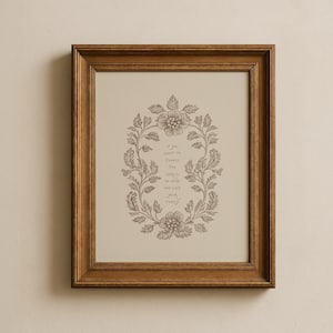 Peut inclure: Un cadre en bois marron contenant une impression avec une couronne florale et le texte "If you want to change the world, go home and love your family."