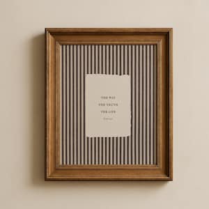 May include: A rectangular wooden frame containing a vertical dark brown and beige striped background. Centered is a cream-colored paper with torn edges featuring the black text: THE WAY, THE TRUTH, THE LIFE, John 14:6.
