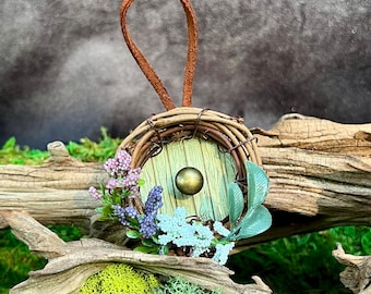 Whimsical Fairy Door Ornament with Floral Wreath: Miniature Garden Decor