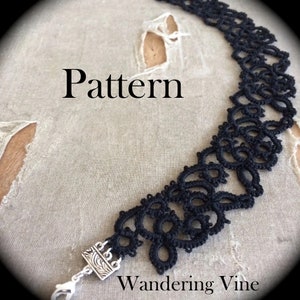 May include: Black lace choker necklace with a silver clasp. The necklace is on a light brown fabric background. The text "Pattern" and "Wandering Vine" are visible in the image.