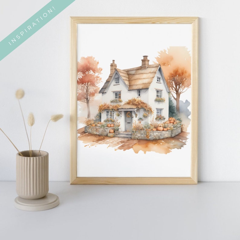 May include: A watercolor painting of a white cottage with a thatched roof, surrounded by fall foliage and pumpkins. The cottage has a gray door and windows, and a wreath on the door.