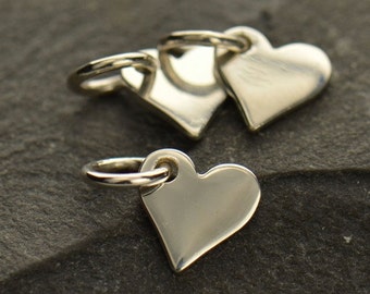 One Sterling silver flat heart charms. Stamping blank.