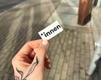 Sticker *innen auf weißem Hintergrund