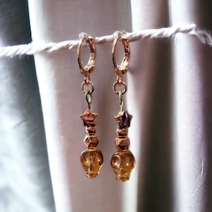 Orange skull earrings, rose gold colour, huggie clasps, brass hooks, plastic hooks