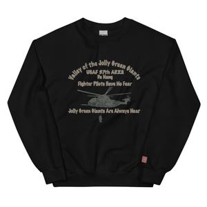 May include: Black sweatshirt with the text "Valley of the Jolly Green Giants USAF 37th ARKS Pa Hang Fighter Pilots Have No Fear Jolly Green Giants Are Always Near" and a helicopter graphic. Features a small American flag on the sleeve.