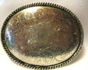 Belle boucle de ceinture réversible faite à la main et avec une très belle gravure en alpaga