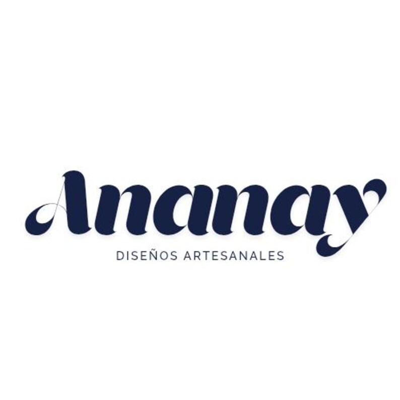 May include: A logo for a business called "Anamay" with the tagline "Dise&ntilde;os Artesanales" in black text on a white background.