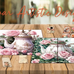 May include: Two decorative teacups with pink roses and a teapot on a wooden table. The teacups and teapot are white with gold accents and floral designs. The teacups are on coasters with a floral design. The table is made of wood and has a natural finish.