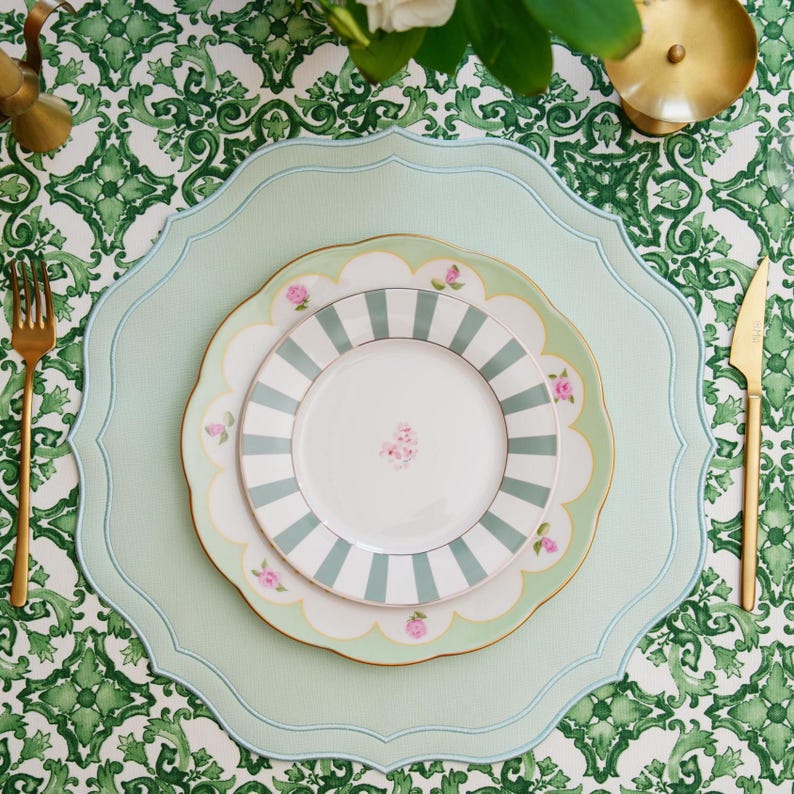 Elegant Easter brunch table setting with light green faux leather dining mat