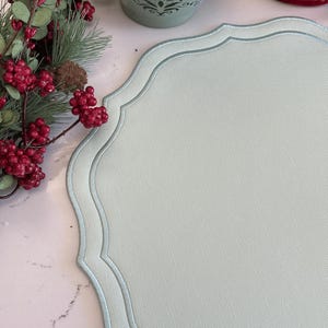 Detailed View of Stitching and Embroidery on PNR Decor’s Faux Leather Placemat – Orchid Light Green Color with Elegant Silk Thread for a Luxurious Handmade Look
