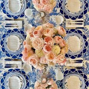 Navy blue scalloped placemat set styled for an elegant Mother’s Day table with gold cutlery and fine china, waterproof embroidered table decor, ready to ship with fast US delivery