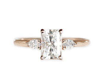 emerald cut moissanite solitaire ring, made with SCS recycled 14k and 18k gold