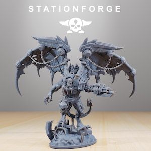 May include: A gray miniature figure of a winged demon with a mechanical arm holding a gun. The figure has a tail and is standing on a rocky base. The text "STATIONFORGE" and a skull logo are at the top.