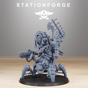 May include: A grey miniature robot figure with a gun, mounted on a circular base. The figure has intricate mechanical details, including gears, tubes, and armour plating. The word "STATIONFORGE" is printed at the top.