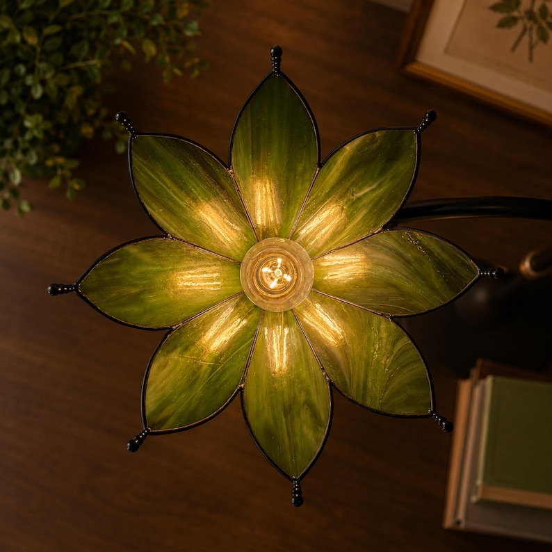Underside view of handmade botanical stained glass flower lampshade showing handcrafted glass petals and brass fitting