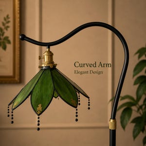 Elegant curved arm floor lamp with handmade green stained glass shade for vintage living room and reading corner