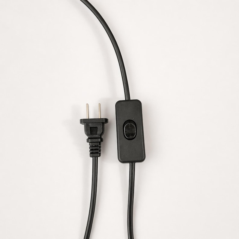 Black plug and inline switch detail for the piano stained glass table lamp cord