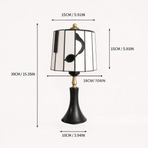 Measurement chart for piano stained glass table lamp showing height, shade diameter, shade height, and base diameter.