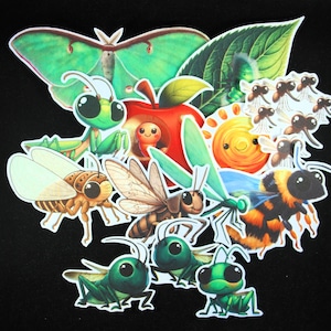 May include: A collection of colorful insect stickers featuring a green praying mantis, a bee, a dragonfly, a moth, a ladybug, and a sun. The stickers are on a black background.