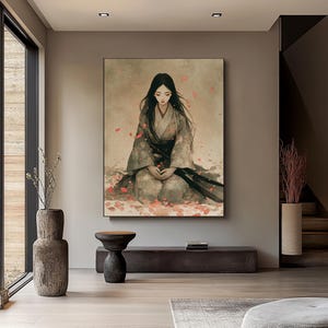 May include: A framed artwork depicts a woman in traditional Japanese attire, seated amidst falling pink petals. The artwork features a muted color palette with soft, flowing lines, creating a serene and contemplative atmosphere. The woman's long black hair cascades down her back.