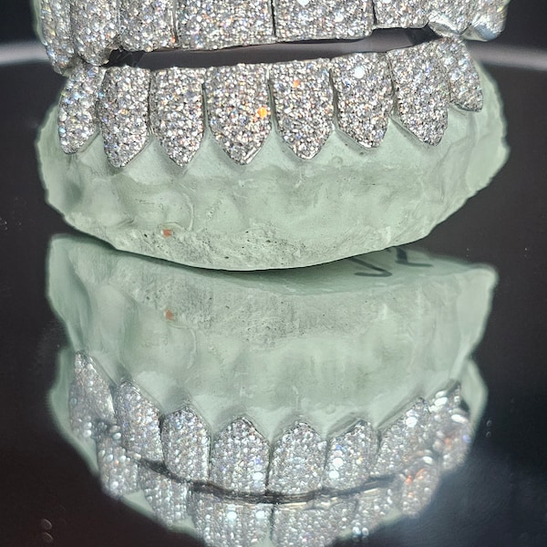 Iced out VVS moissanite grillz (custom fit)