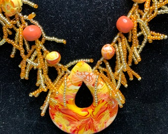 Yellow & Orange Cha Cha Beaded Necklace With Button Closure