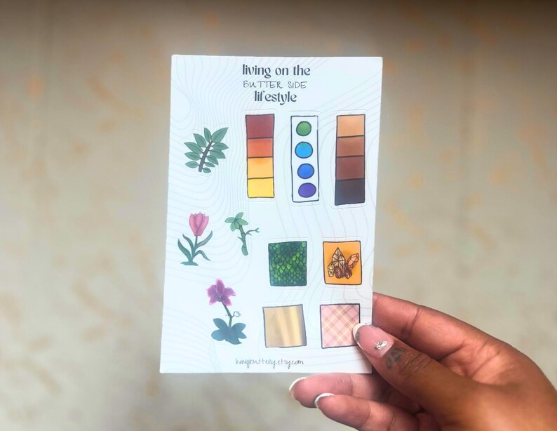 color palettes, textures, and nature, flowers and plants sticker sheet in hand. shows close up of each sticker.