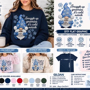 May include: A navy blue crewneck sweatshirt featuring a graphic of a gnome wearing a blue hat with snowflakes, holding a mug labeled Hot Cocoa, with the text Snuggle up gnomies it's cold outside. Includes color options and care instructions.