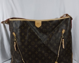 Bolso encantador con monograma Louis Vuitton