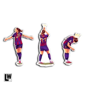 May include: Three stickers featuring a soccer player in a blue and red striped jersey and shorts. The player is shown in three poses: arms outstretched, clapping with the name Alexia and number 11 on the back, and bowing with a yellow crown icon.