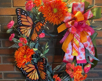 Large Oval Grapevine wreath, Beauty pinks and orange design, large butterfly embellishments, Full grapevine coverage, bright, happy colors