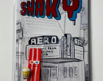 3-D Movie Shaky Bacon wood figure on card